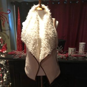 Boutique vest very comfortable and oversized.